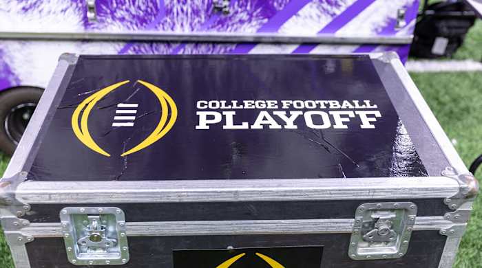 A general view of the College Football Playoff logo on a case on the Washington Huskies sideline before the 2024 Sugar Bowl college football playoff semifinal game between the Texas Longhorns and the Washington Huskies at Caesars Superdome in New Orleans, Jan. 1, 2024.